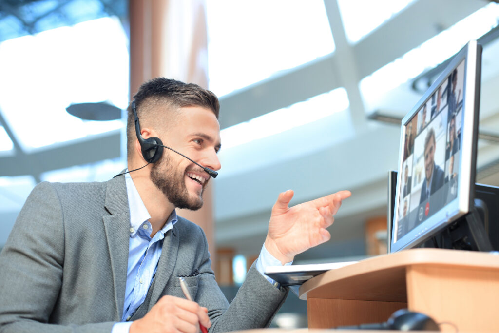 Bluefinch-esbd - businessman speak talk video call with colleagues online briefing