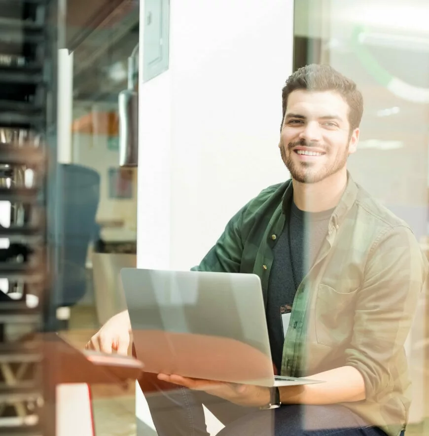 Bluefinch-esbd - bluefinch esbd engineer with laptop hand working datacenter e1776326363821